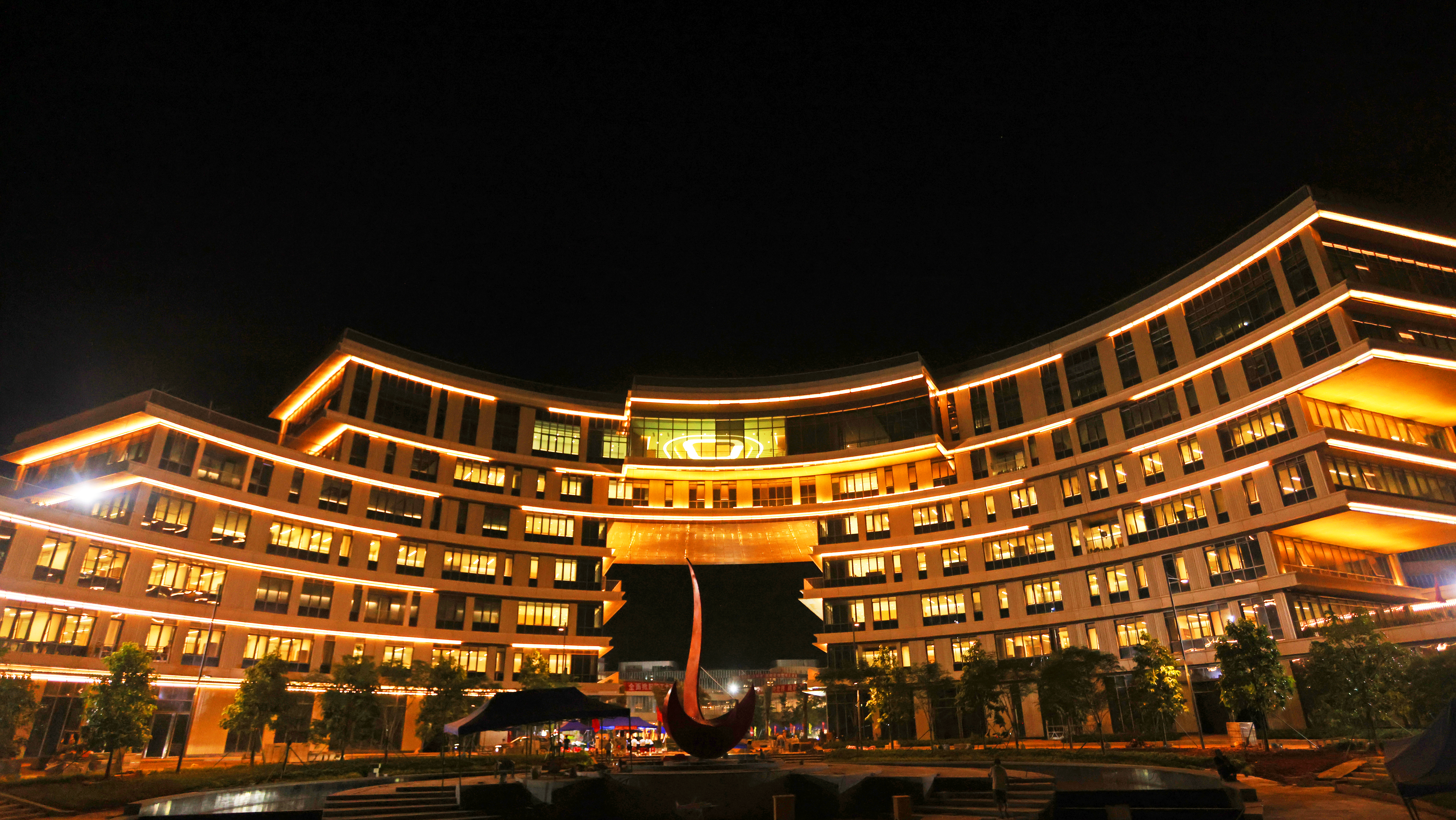 Night view of the HKUST(GZ) Piazza and Administration Building.