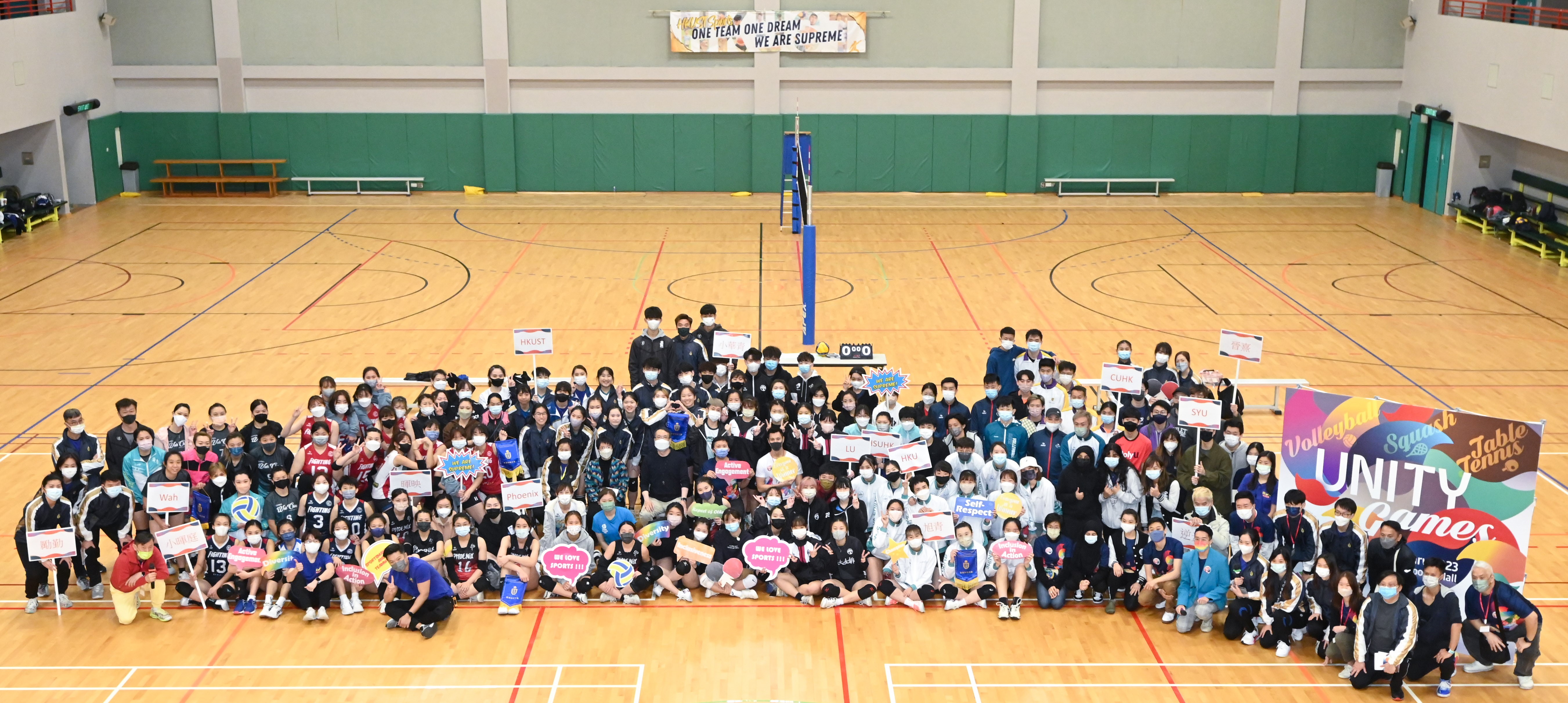 A photo of participating students, volunteers and officiating guests of the Unity Games before the matches.