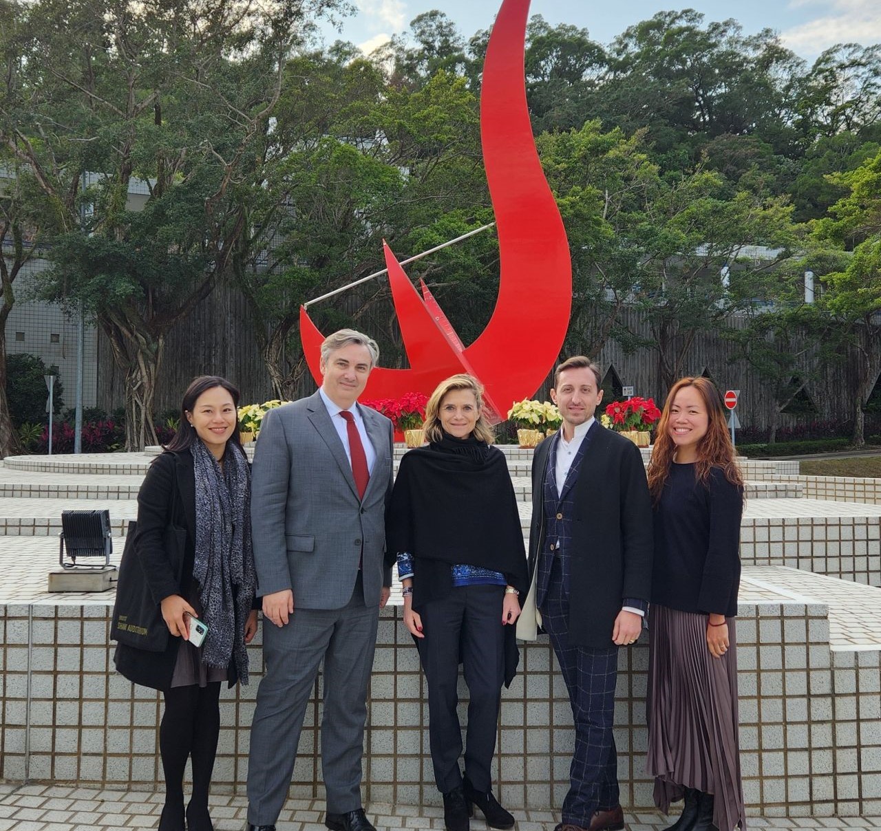 Delegation of Fondation de France delegation took a photo in front of the iconic “Red Bird” sculpture at the Piazza.