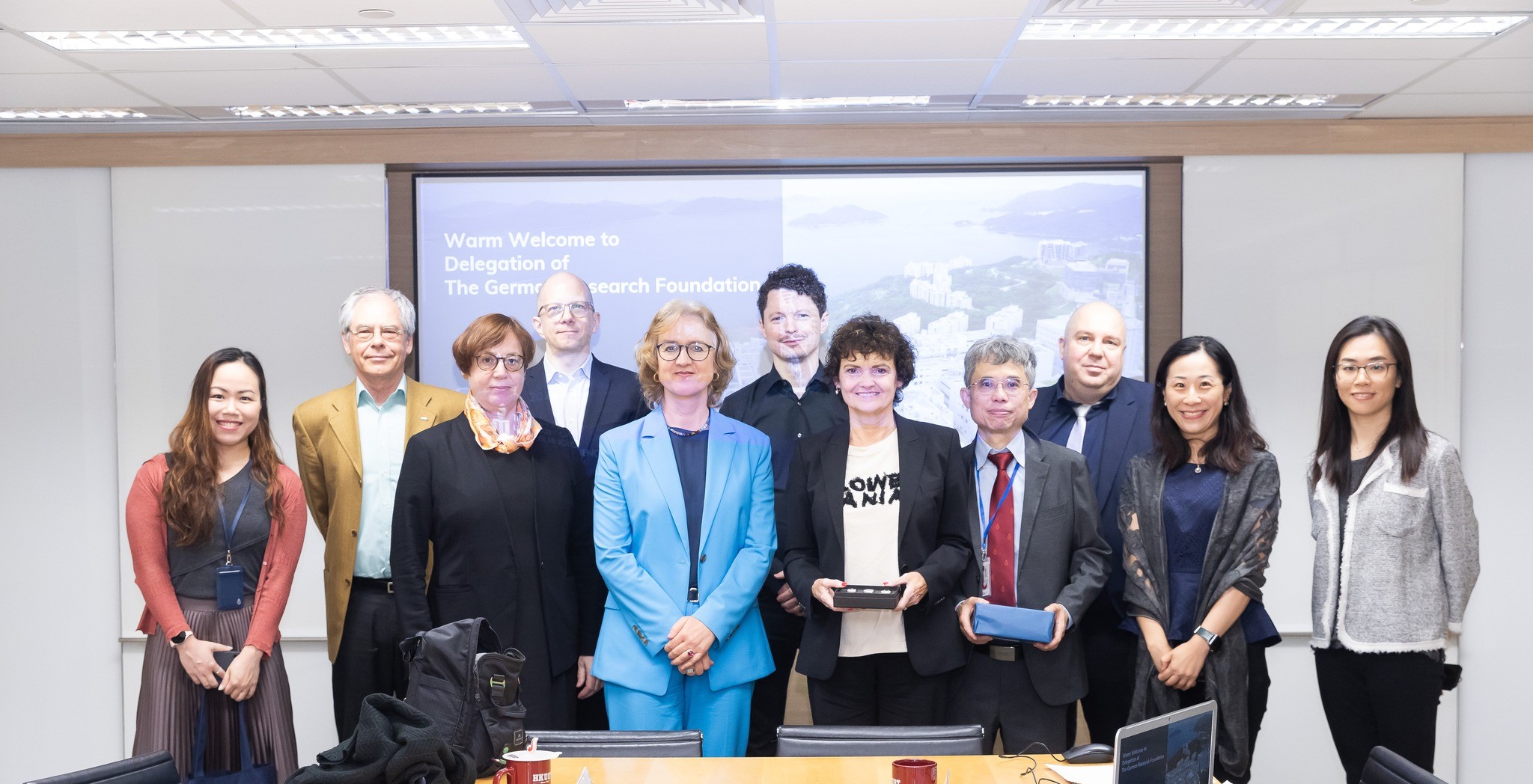 HKUST Associate Vice-President for Research and Development (Research) Prof. CHAN Che Ting (third right, front row), German faculty members Prof. Berthold JÄCK (second right, back row), Prof. Stefan NAGL (first right, back row) and Head of Global Engagement and Greater China Affairs Yvonne LI (second right, front row) engage in a meeting with the German Research Foundation delegation led by Dr. Annette SCHMIDTMANN.
