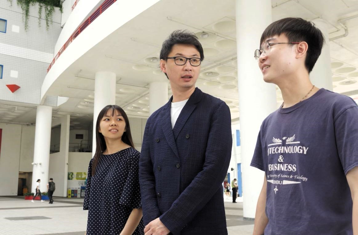 Prof. Leung walking with his students