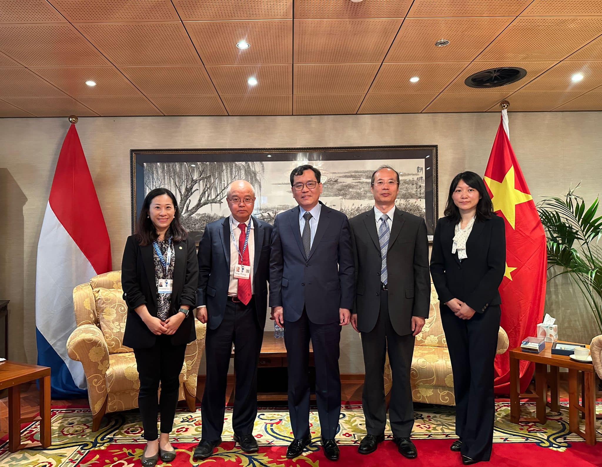 HKUST Vice-President for Institutional Advancement Prof. WANG Yang (second left) and Head of Global Engagement & Greater China Affairs Ms. Yvonne Li (first left) meet with H. E. Ambassador TAN Jian (center) at the Embassy of the People's Republic of China in the Kingdom of the Netherlands.