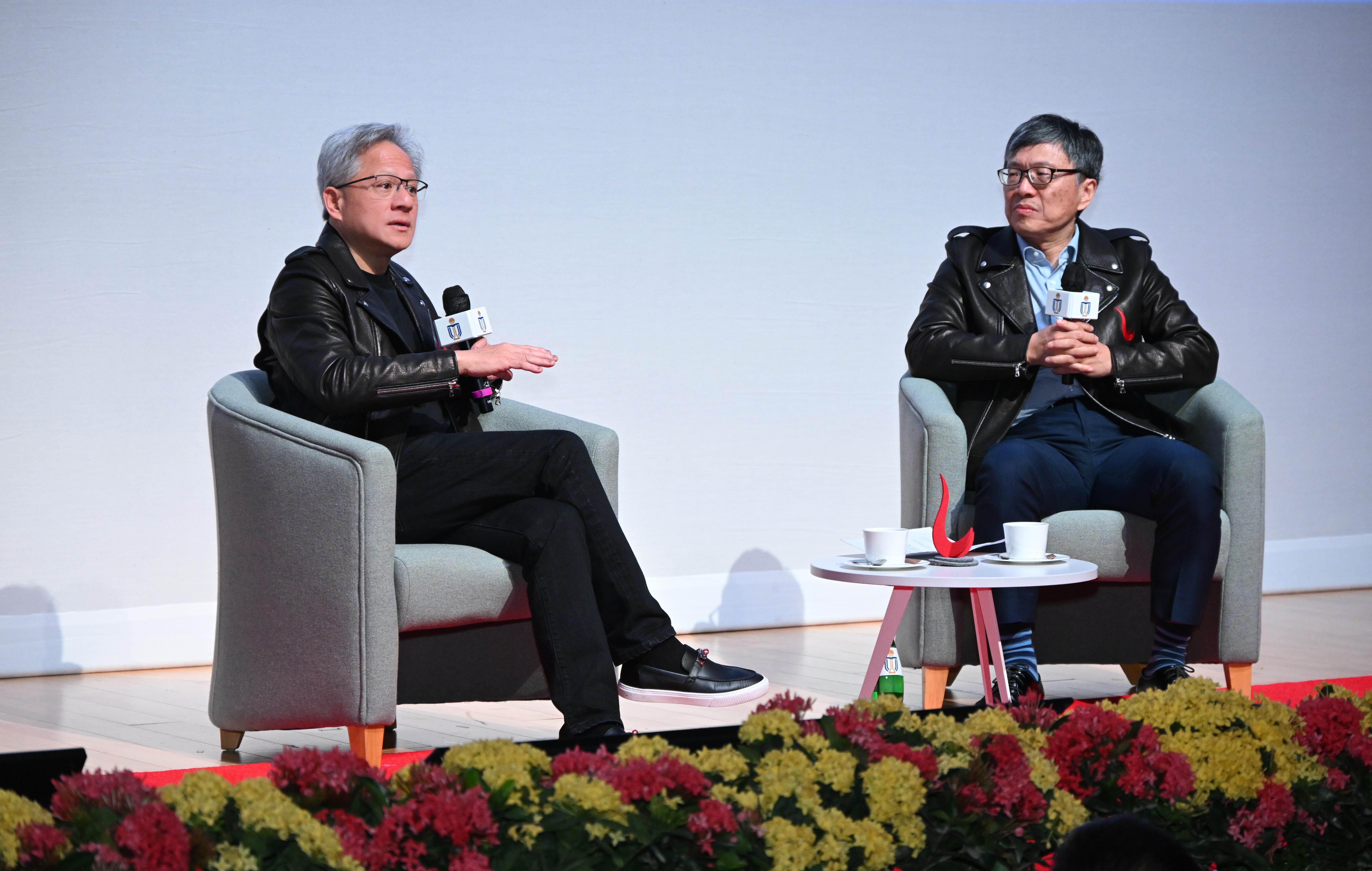 HKUST Council Chairman and renowned AI expert Prof. Harry SHUM (right) chairs an enlightening fireside chat session with Dr. Jensen HUANG (left)