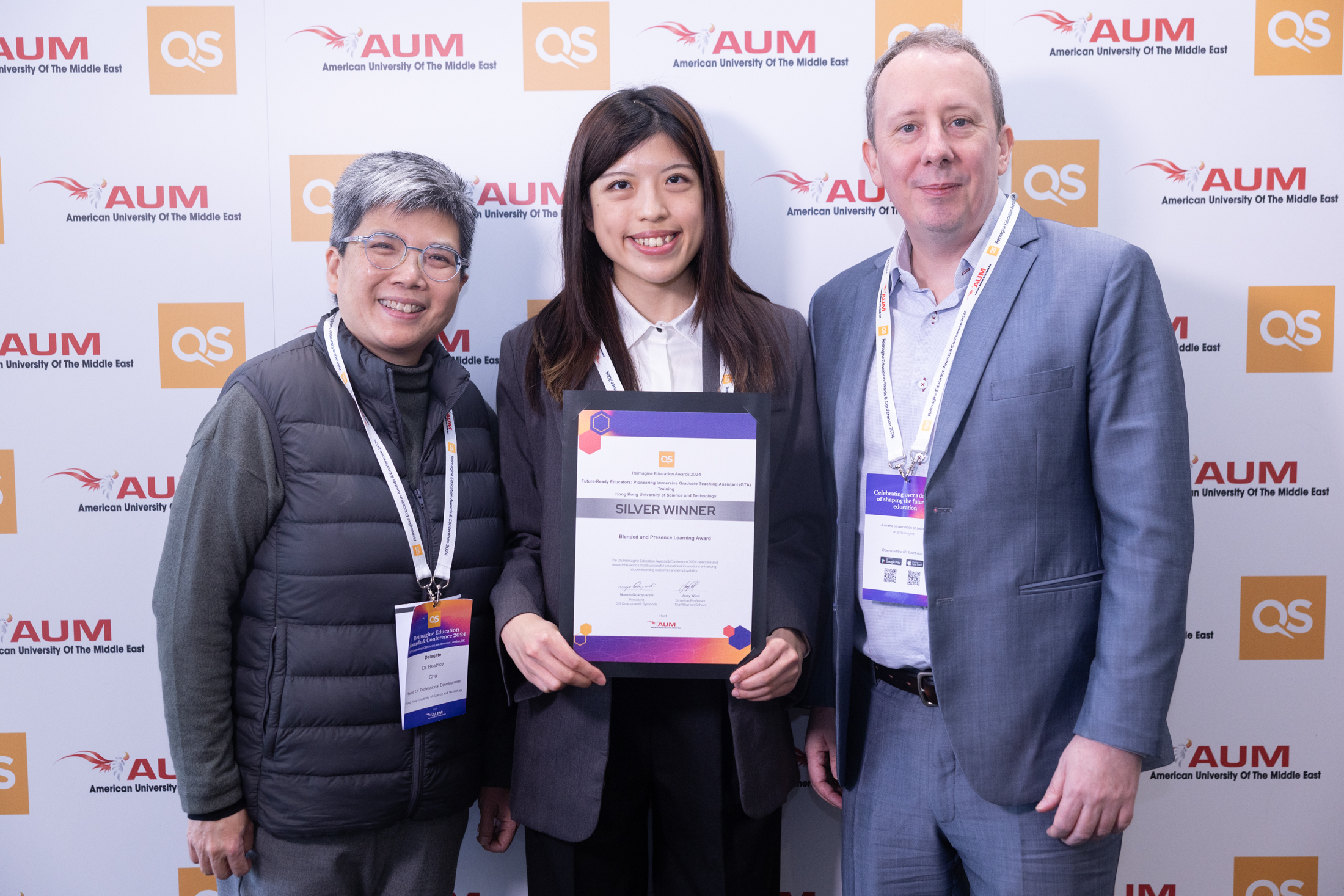 (From right) HKUST CEI’s Director Dr. Sean McMINN; Head of Professional Development Dr. Beatrice CHU; and Assistant Education Development Manager Ms. Karina YUEN receives a Silver Award in the “Blended and Presence Learning” category at this year’s QS Reimagine Education Awards ceremony in the UK. Among the team members also includes Senior Officer (Educational Evaluation) Mr. Eric YEUNG of CEI. 