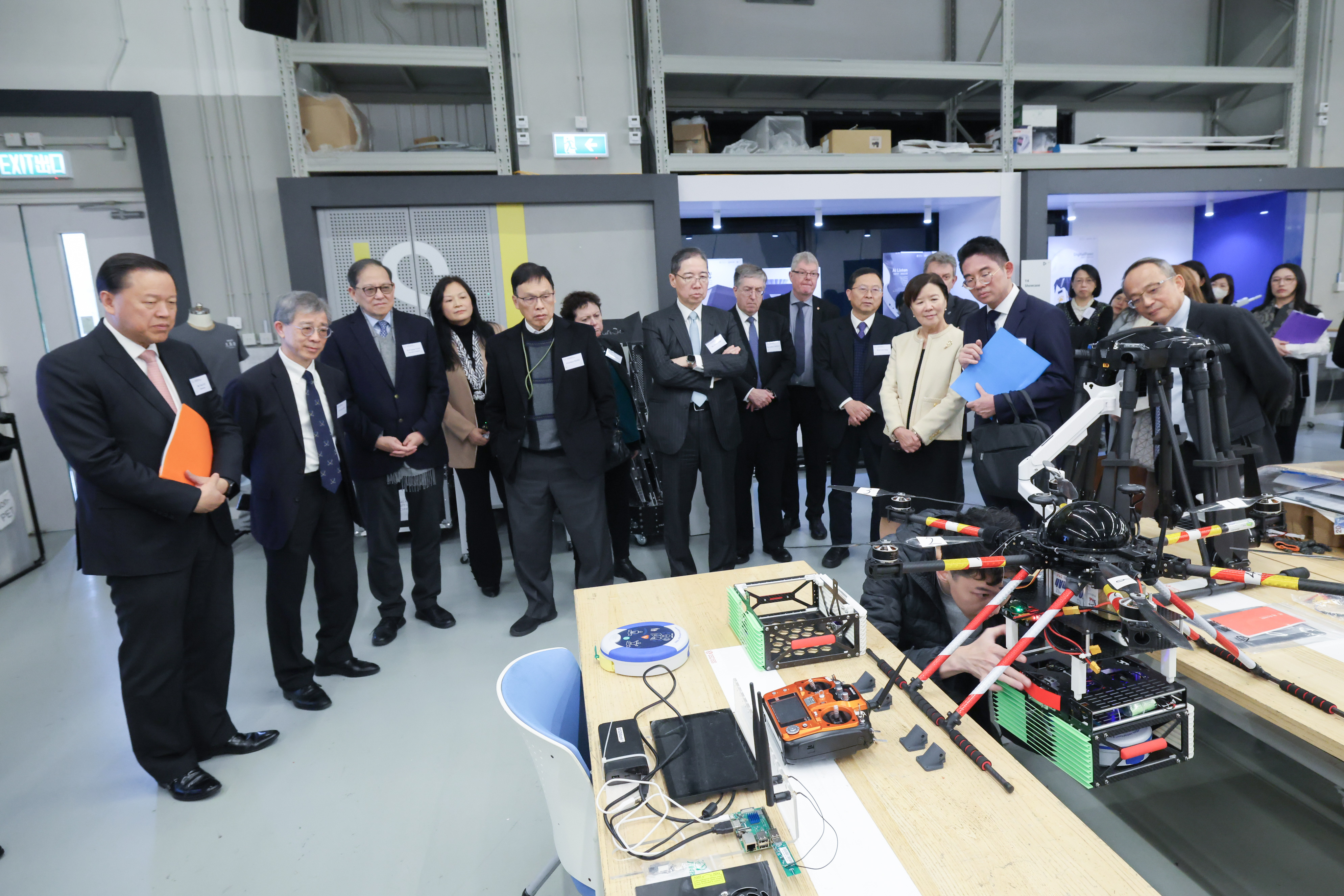 HKUST Integrative Systems and Design students showcase their innovative drone design project intended for finding lost hikers. 