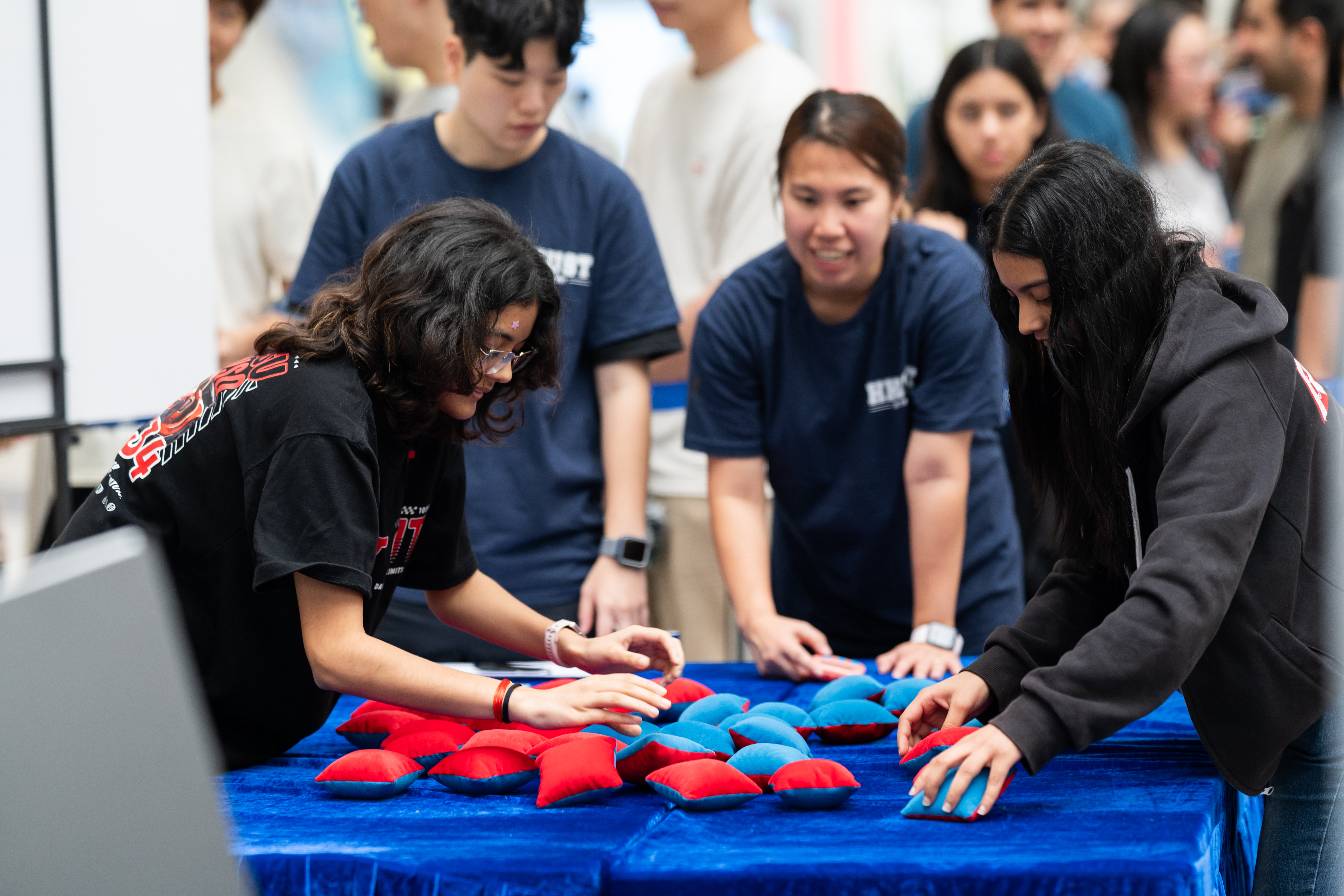 At the Flip Battle booth, competitors raced to flip pillows to their designated color within 35 seconds.