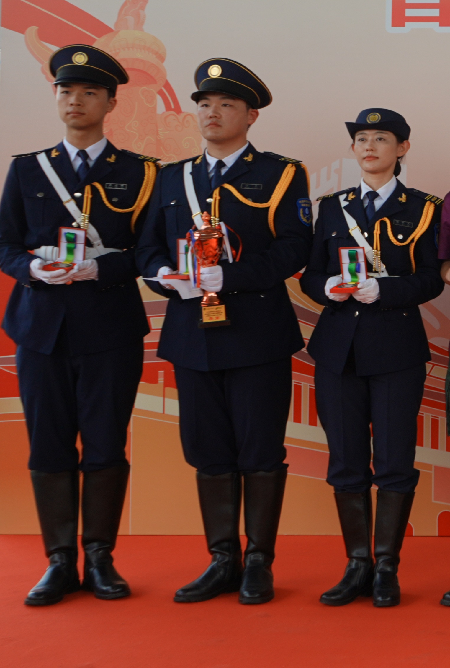 The Bronze Award for the Quick March team was won by (from left) TONG Kin Pok, a Year 2 undergraduate in Biotechnology, ZHANG Qiao, an MPhil student in Computer Science & Engineering, and XU Zijie, a PhD student in Atmospheric Environmental Science. XU Jiarui, a Year 2 undergraduate in Economics, is absent due to sickness.