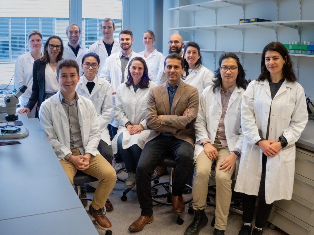 Lam with his research colleagues at EPFL.