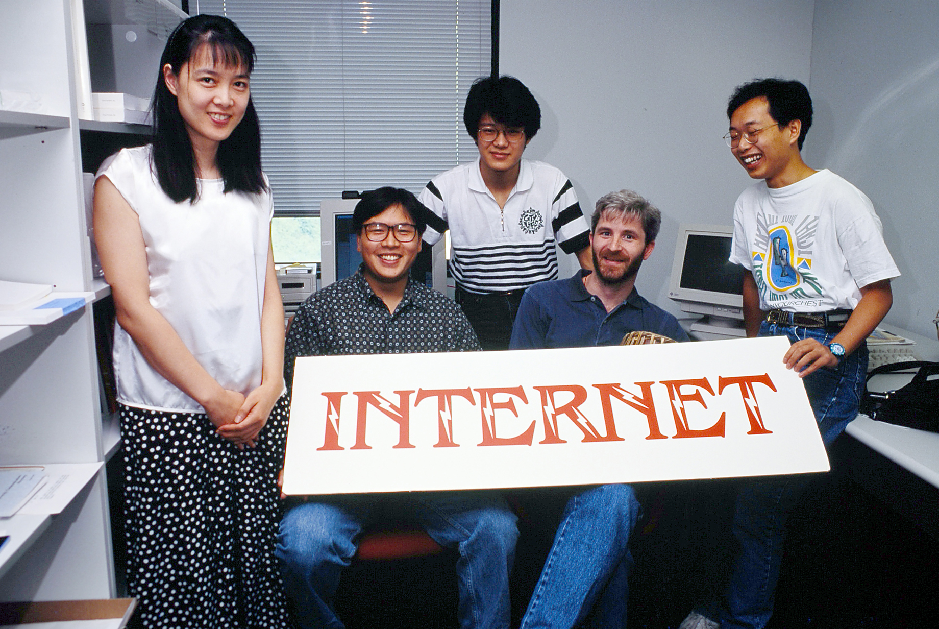 Dr. Kwan (not in picture) points out that CCST played an supporting role in HK Supernet, a key HKUST technology legacy established in 1993. The Company eventually became the first licensed ISP in Hong Kong. It was co-founded by Pindar Wong (second from left), who pursued a Sir Edward Youde Memorial Fellowship-funded doctorate  at the HKUST but later dropped out to found the company; and Prof. Scott Deerwester (second from right), a lecturer at the Department of Computer Science.  (Photo courtesy: HKUST Scho