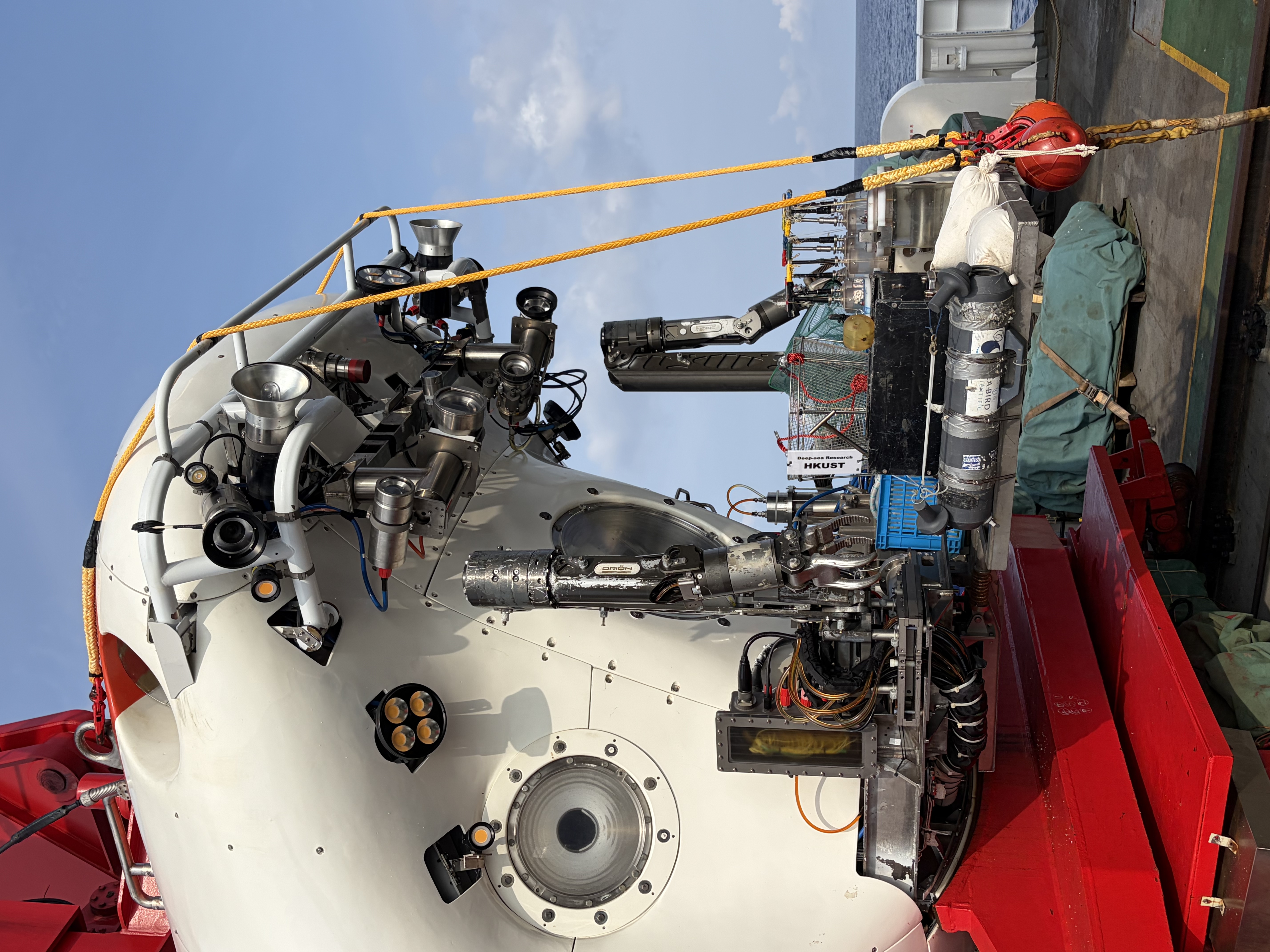Jiaolong manned submersible equipped with various tools for sediment, water, and biological sampling