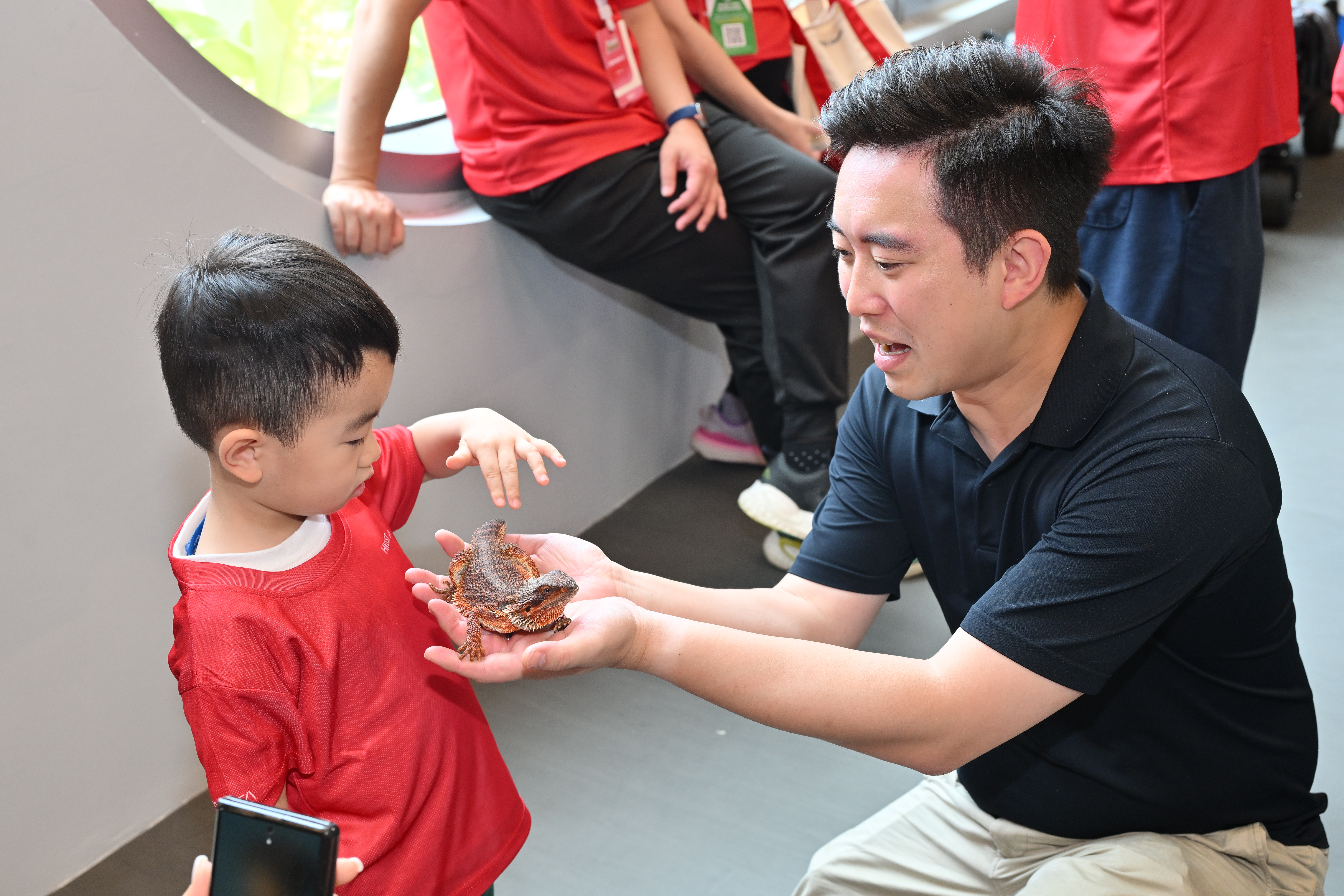 Young participants delighted in hands-on encounters with reptiles and small animals, fostering curiosity and an appreciation for nature.