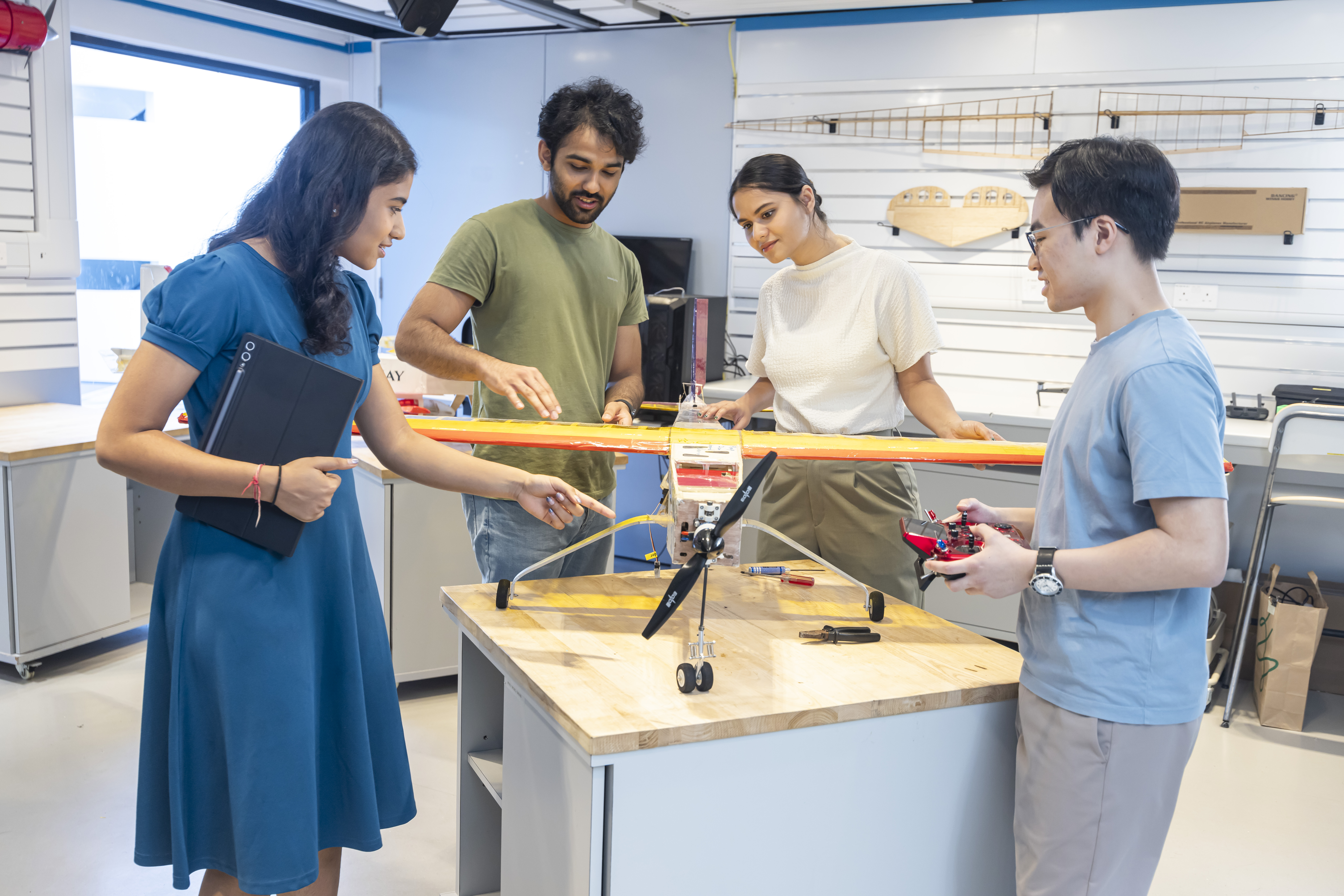 In addition to the workspaces at Student Residence Halls 8 and 9, the Fei Chi En Dream Team Open Lab opposite the Engineering Commons serves as another maker space where student teams can turn innovation into competition-ready prototypes.