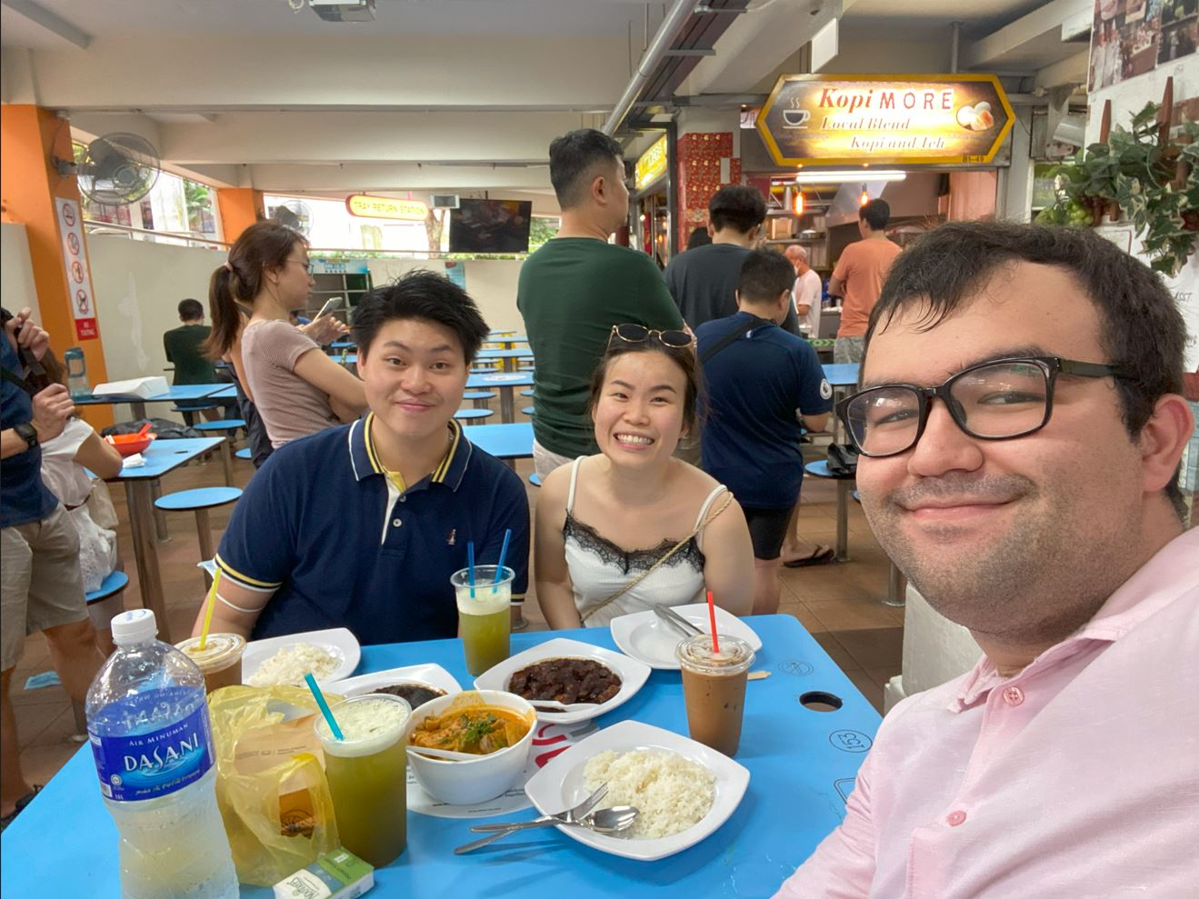 Yigit (right) catches up with his HKUST seniors in Singapore