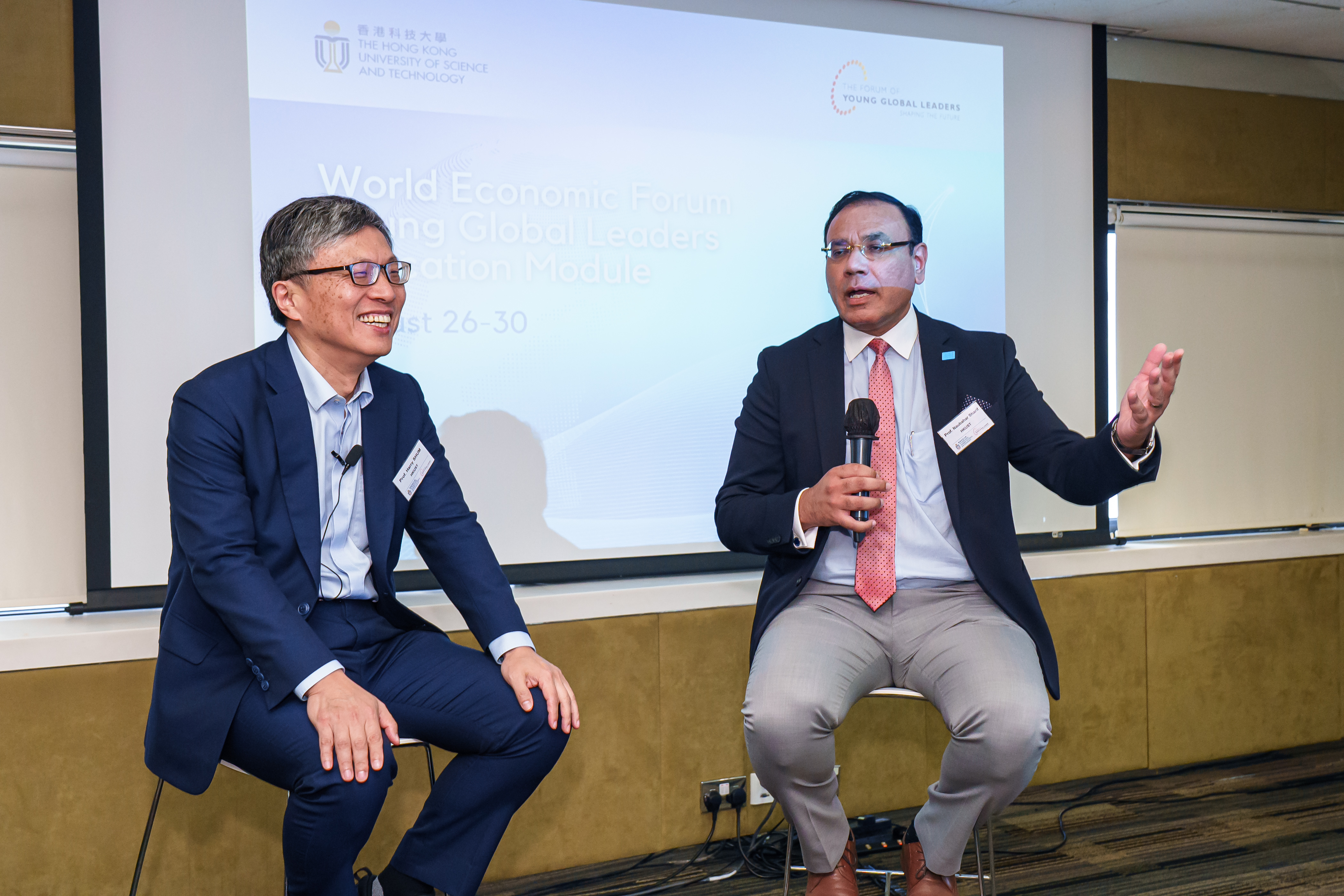 HKUST Council Chairman Prof. Harry Shum (left) and Prof. Naubahar Sharif (right), Co-lead faculty of the YGL program and Head and Professor of the Division of Public Policy, led discussion about AI’s influence on the future of work.