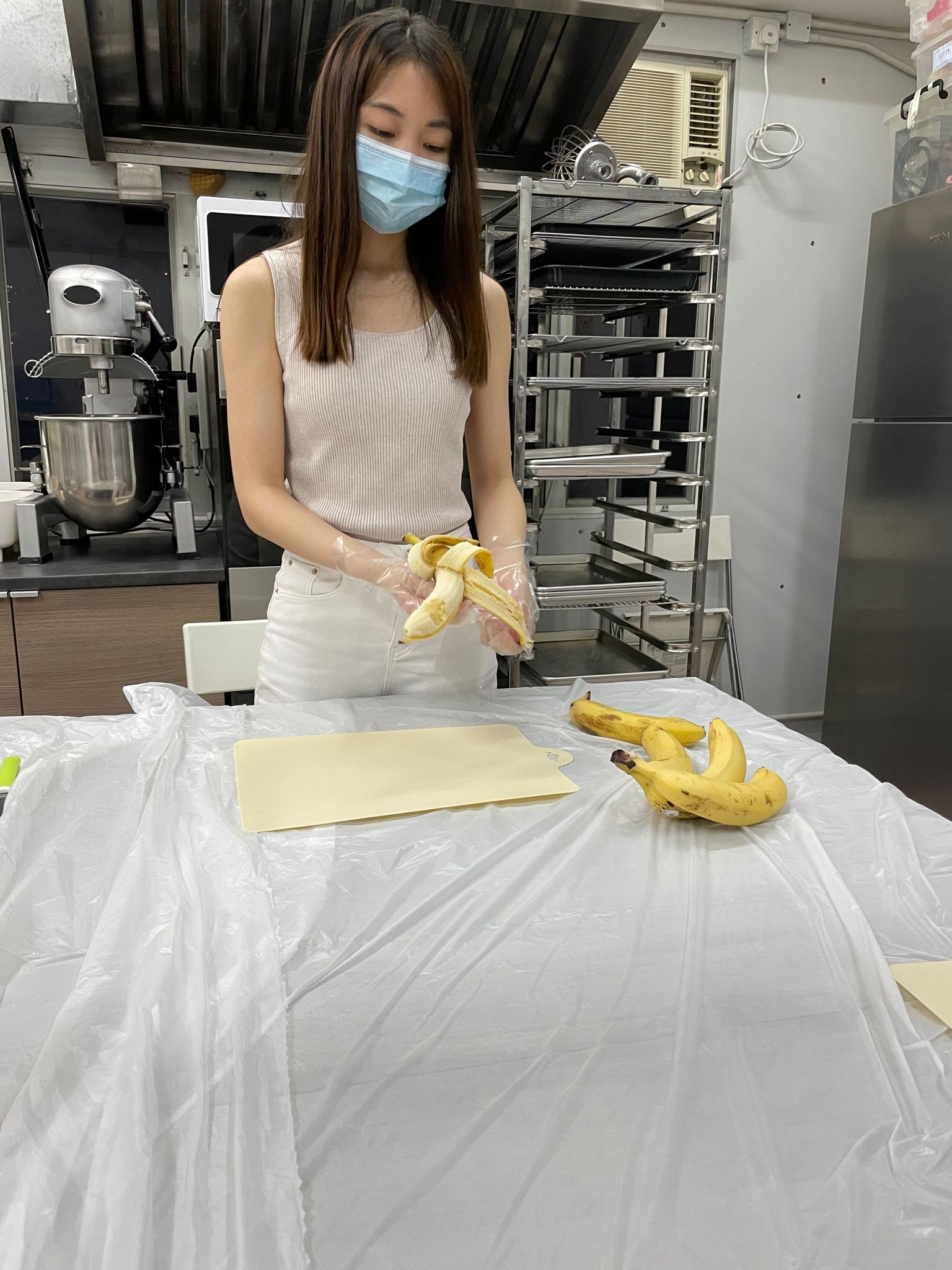 Lilia peels banana