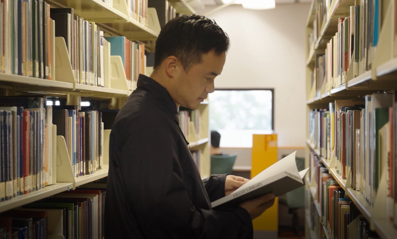 Ka Sing-Fung reading a book at HKUST library