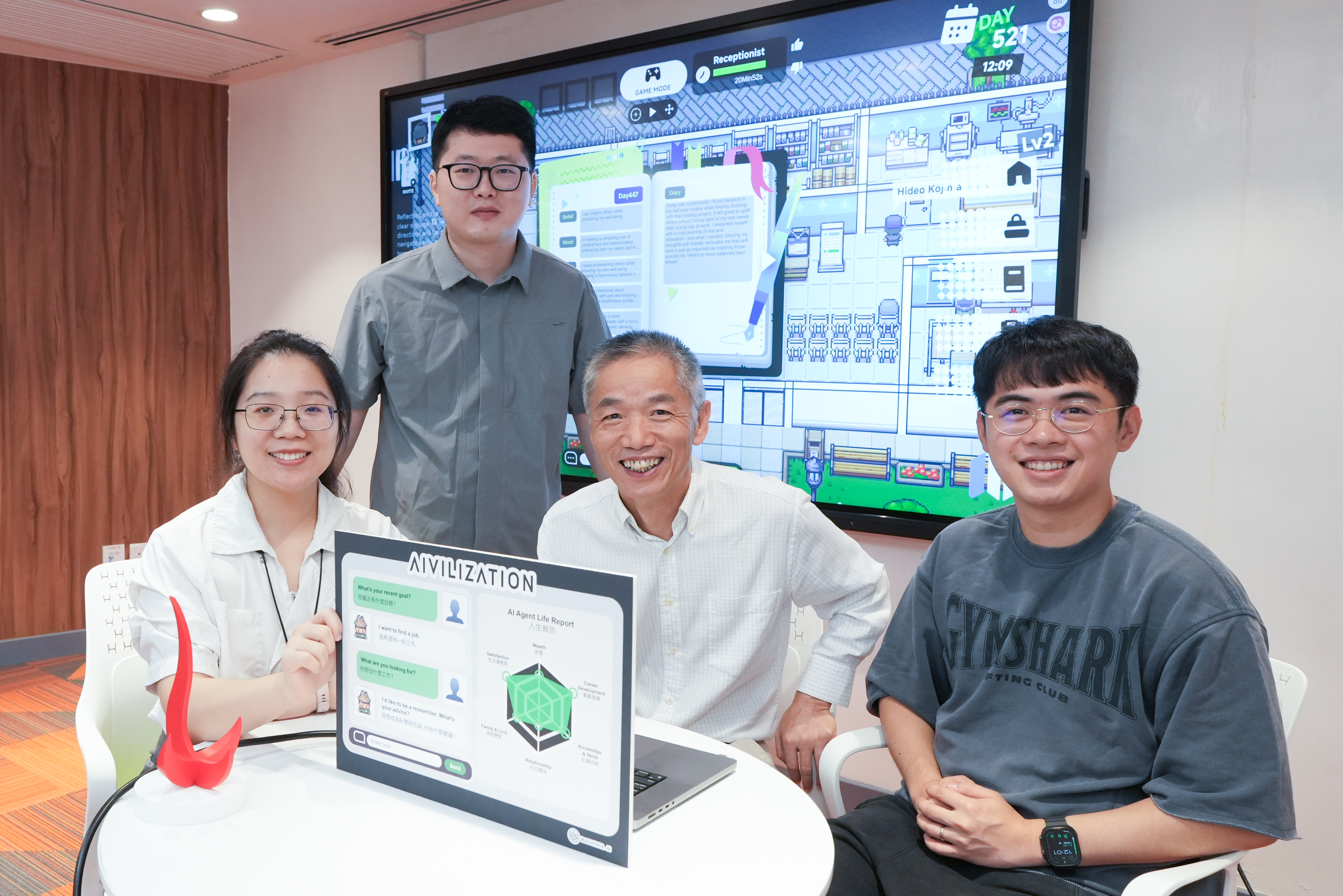Prof. CHEN Kani from the Department of Mathematics and the Department of Industrial Engineering and Decision Analytics at HKUST (front row, middle) and his PhD student in Mathematics Mr. YANG Haowei (back row), have led the development of “Aivilization”, the largest-scale AI multi-agent social simulation sandbox to date. Maths PhD student Mr. Ricky Chan (front row, right) and computer science Mphil student Miss CHEN Xingyan (front row, left) are members of the research team