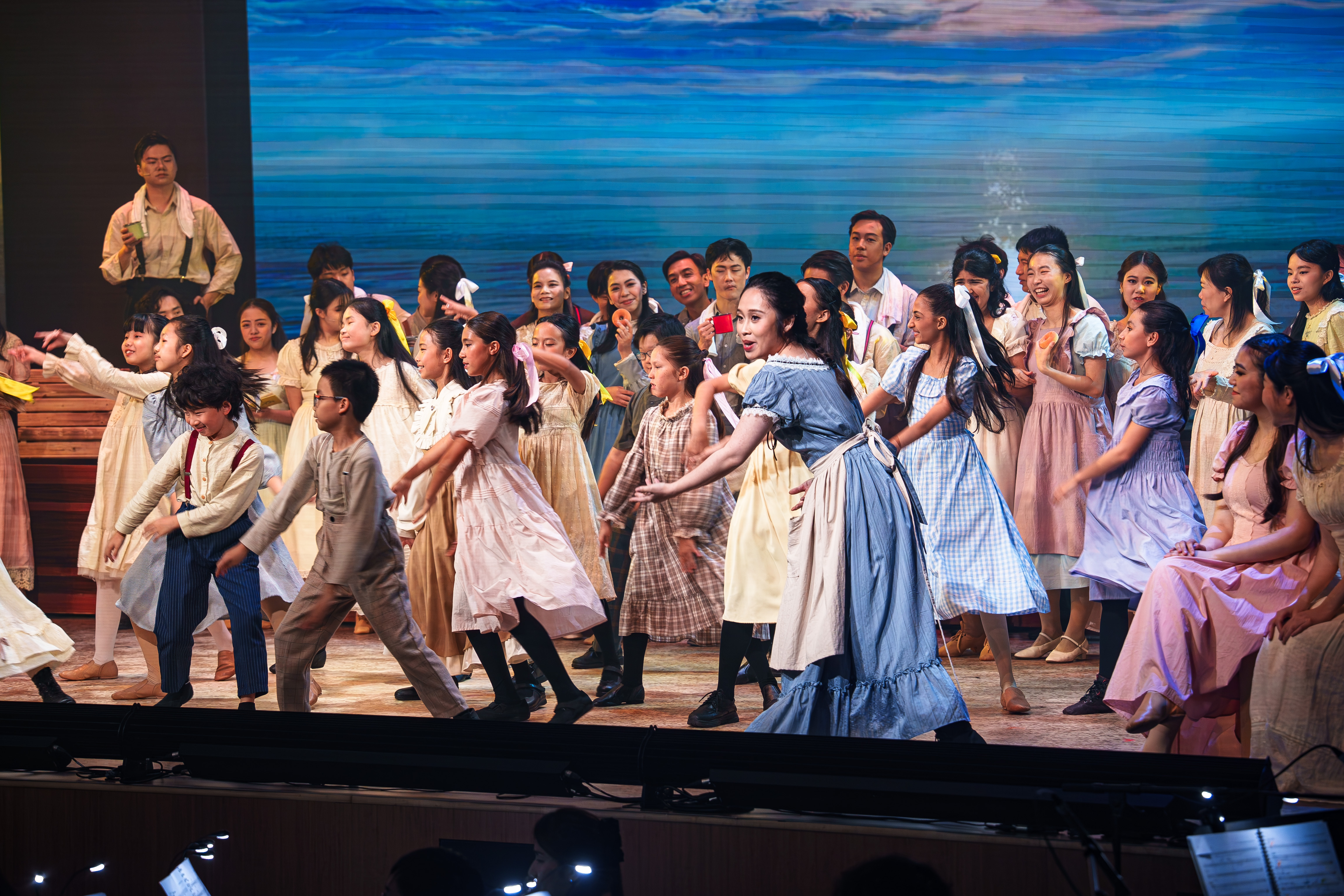 A vibrant cast of students, faculty, staff, alumni, and children shared the spotlight in this community project.