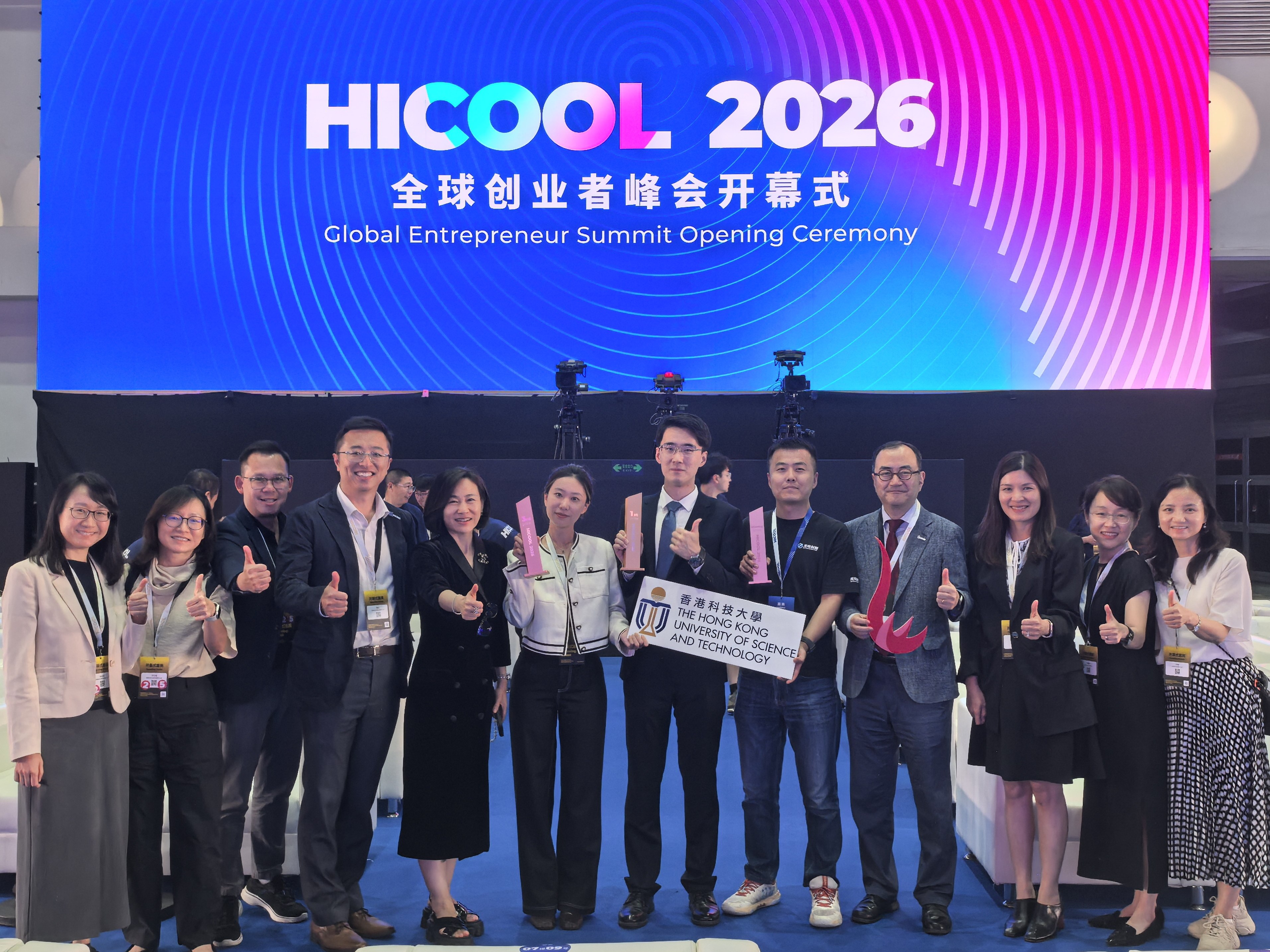 Group photo of Dr. Shin Cheul Kim (fourth right) and the award-winning teams: Overseas Group Champion and First Prize recipient Dr. YAN Zhaoxu (sixth right), PhD graduate in Microelectronics of the Department of Electronic and Computer Engineering of HKUST and Co-founder of Mosense Technology; Overseas Group Second Prize recipient Mr. ZHOU Shuai (fifth right), representative of Skyland Innovation; and Overseas Group Third Prize recipient Dr. CHENG Yuechu (sixth left), a PhD student of the Department of Elec