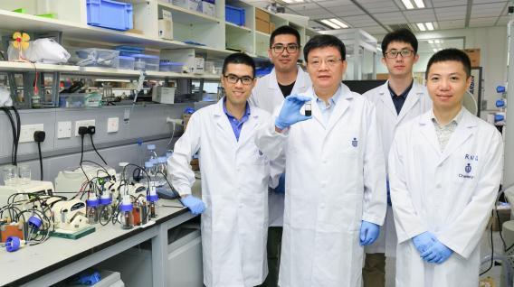 Prof. Zhao Tianshou (middle) and Prof. Chen Qing (first from left) and their research teams.