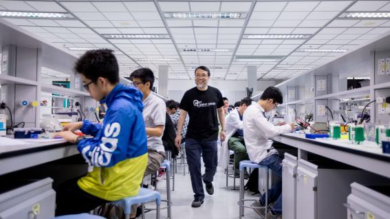 Prof. King Chow (Middle) wants to change the way biology is being taught and perceived in local schools by bringing in the International Biology Olympiad.