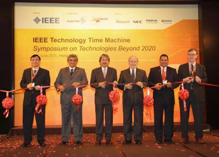  Ribbon cutting by the officiating party. (From left) Dr Cheung Nim-kwan, General Co-Chair of the Organizing Committee; Prof. Roberto de Marca, Executive Chairman of the Organizing Committee; Mr John Tsang, Financial Secretary, Hong Kong SAR Government; Dr Gordon Day, President-Elect, IEEE; Prof. K. B. Letaief, General Co-Chair of the Organizing Committee and HKUST Dean of Engineering; and Prof. Yrjö Neuvo, Program Committee Chair.