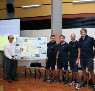  HKUST President Prof. Tony F Chan (left) presents the University's sustainability road map to Captain Erwann Le Rouzic (second from left) and the crew members