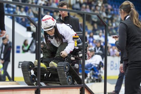  Carol Ng Cho-yu passing one of the obstacles in Cybathlon using the HKUSTwheels powered wheelchair. (Photos from ETH Zurich, Photographer: Alessandro Della Bella )
