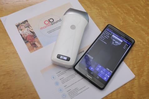  Mamosound (white device) will show its users in a mobile app whether they have breast cancer cells