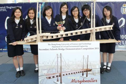  The winning team - from Maryknoll Convent School - with their bridge after the competition, and their award