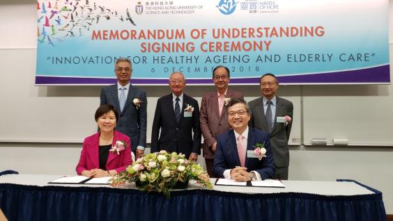 Prof. Nancy IP (front left), HKUST Vice-President for Research and Development, and Dr. LAM Ching-choi (front right), HOHCS Chief Executive Officer sign the MOU. Prof. Nancy IP (front left), HKUST Vice-President for Research and Development, and Dr. LAM Ching-choi (front right), HOHCS Chief Executive Officer sign the MOU.
