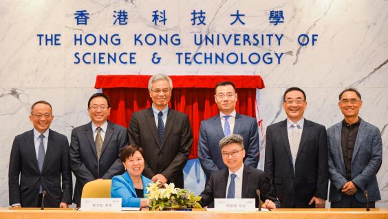 Prof. Nancy IP (front left), HKUST Vice-President for Research and Development, and Mr. Henry MA (front right), Executive Vice-President and Chief Information Officer of WeBank sign the agreement. Prof. Nancy IP (front left), HKUST Vice-President for Research and Development, and Mr. Henry MA (front right), Executive Vice-President and Chief Information Officer of WeBank sign the agreement.