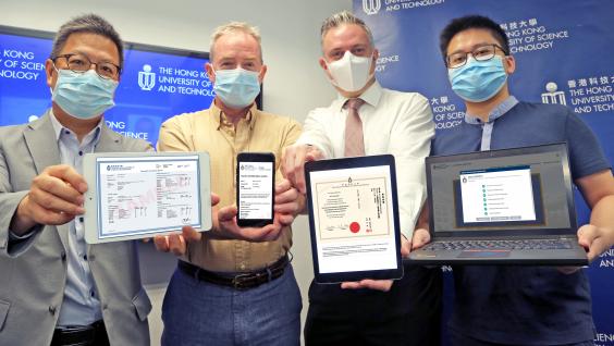 (From right) Prof. CHEN Qifeng, Assistant Professor of the Department of Computer Science and Engineering at HKUST; Mr. James PRINCE, Academic Registrar, HKUST; Mr. Davis BOOKHART, Senior Manager and Head, HKUST Sustainability Unit; and Prof. LO Hong-Kam, Director of HKUST’s GREAT Smart Cities Institute demonstrate how different HKUST documents can be verified using different devices (From right) Prof. CHEN Qifeng, Assistant Professor of the Department of Computer Science and Engineering at HKUST; Mr. James PRINCE, Academic Registrar, HKUST; Mr. Davis BOOKHART, Senior Manager and Head, HKUST Sustainability Unit; and Prof. LO Hong-Kam, Director of HKUST’s GREAT Smart Cities Institute demonstrate how different HKUST documents can be verified using different devices