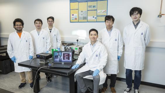 Prof. FAN Zhiyong (third from right), Dr. GU Leilei (second from right) and the research team.  (Stock photo)
