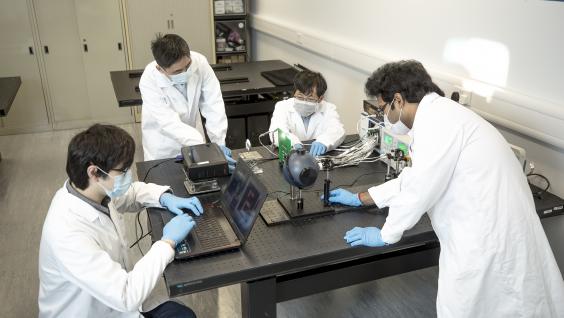 The team demonstrates how the Electrochemical Eye (EC-Eye) works.