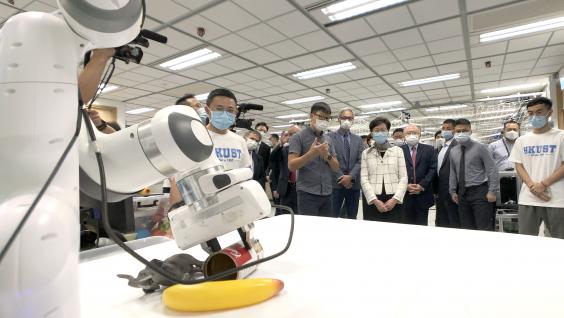 Mrs. Carrie Lam visits the Cheng Kar-Shun Robotics Institute and watches a demonstration of robotic arm. RI