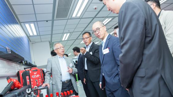 Prof Chung (first left) and Prof Chan (second right) visit the Undergraduate Student-initiated Experiential Learning (USEL) Laboratory among other guests. Prof Chung (first left) and Prof Chan (second right) visit the Undergraduate Student-initiated Experiential Learning (USEL) Laboratory among other guests.