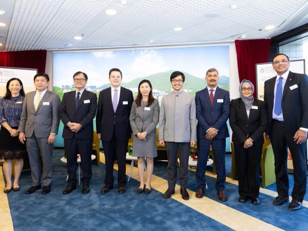 Group photo (from left) Ms. Yvonne LI, Head of Global Engagement and Greater China Affairs, Mr. Chaturont CHAIYAKAM, Consul General of Thailand; Mr. Muzambli MARKAM, Consul General of Malaysia; Mr. Kerim EVCIN, Consul General of Turkiye; Ms. Daisy CHAN, Associate Vice-President (Global Engagement & Communications); Nicholas HO, Belt and Road Commissioner of the HKSAR Government, Mr. Riaz SHAIKH, Consul General of Pakistan, Mrs. Endah YULIARTI, Consul for Information and Socio-Cultural Affairs of Indonesia a