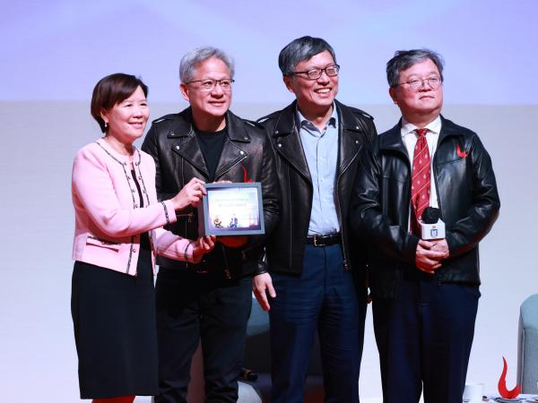 HKUST President Prof. Nancy Ip (left), along with Council Chairman Prof. Harry SHUM (second right) and Provost Prof. GUO Yike (right), presented a gift to Dr. Jensen Huang as a token of appreciation. 