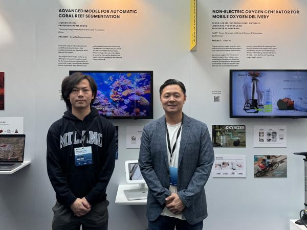 Prof. YEUNG Sai-Kit  (right) from the Division of Integrative Systems and Design (ISD) and his CSE PhD student Mr. ZHENG Ziqiang (left) presents the “Coral Reef Segmentation” at Dubai Future Solutions – Prototypes for Humanity. 