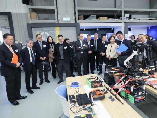 HKUST Integrative Systems and Design students showcase their innovative drone design project intended for finding lost hikers. 