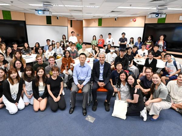 Consul General Mr. Stefan BREDOHL engages in discussion with over 60 students after his sharing session.