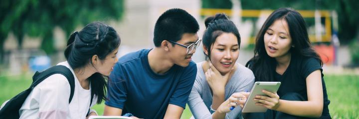 Students sharing a moment at the school garden