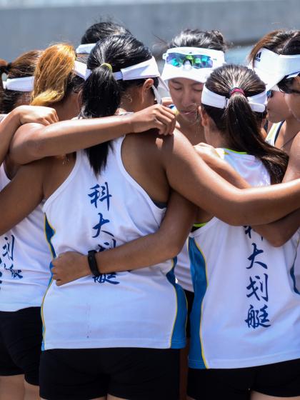 Athletes huddling up before a game