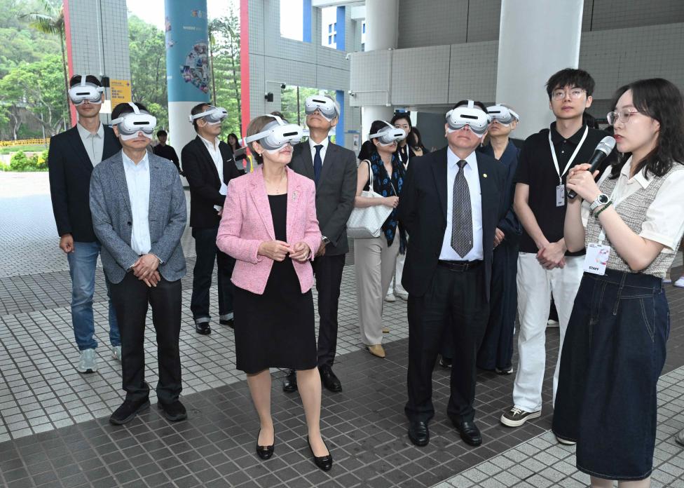Guests don headsets to explore MR artworks around the Clear Water Bay campus.